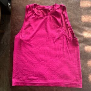 Lululemon tank size 6. Great condition. Magenta.